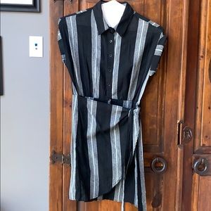 Black and white button down wrap dress.